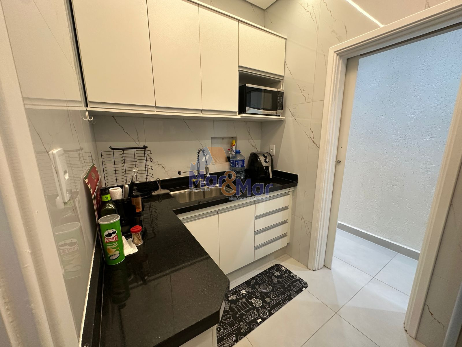 Apartamento na Praia das Pitangueiras, Guarujá - SP