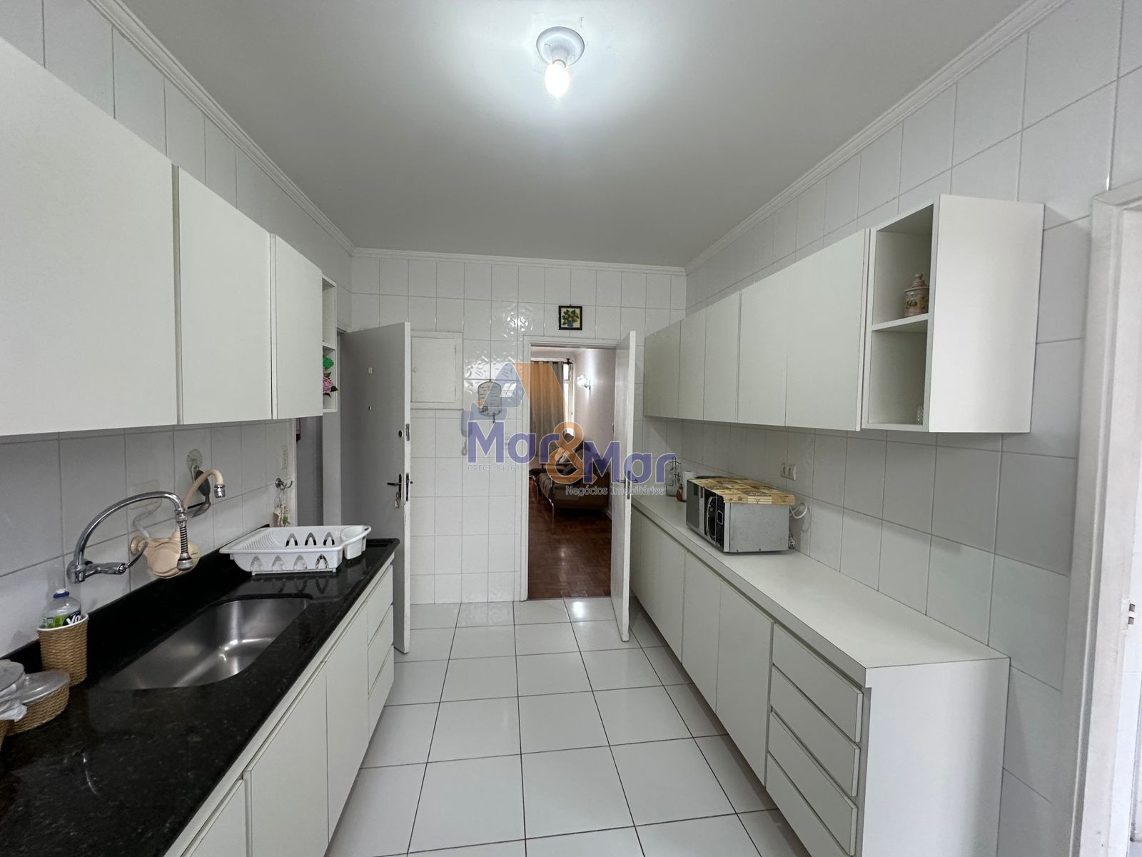 Apartamento na Praia das Pitangueiras, Guarujá - SP