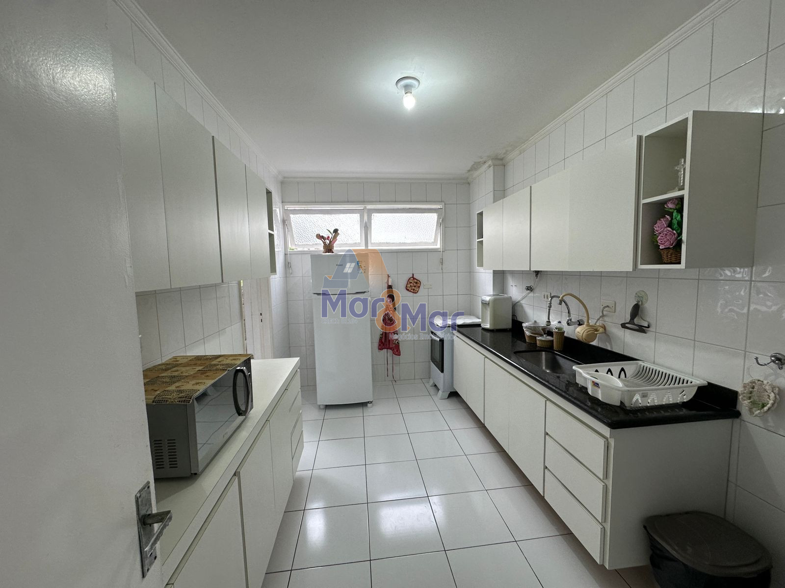 Apartamento na Praia das Pitangueiras, Guarujá - SP