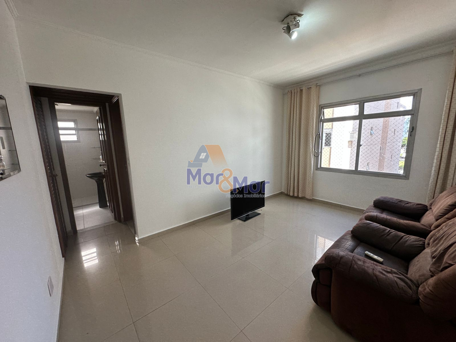 Apartamento na Praia das Astúrias, Guarujá - SP