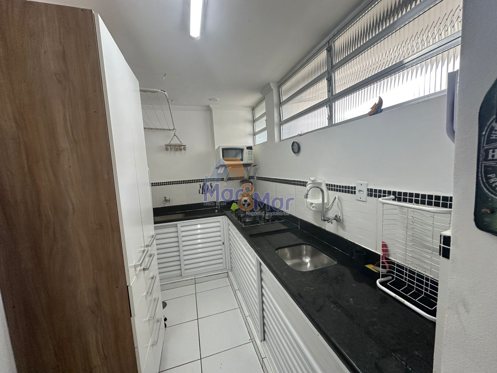 Apartamento na Praia das Pitangueiras, Guarujá - SP