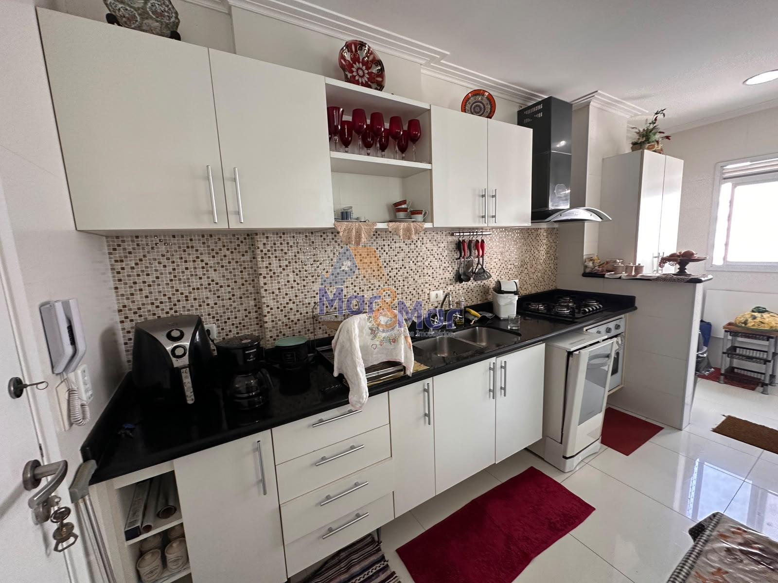 Apartamento na Praia das Pitangueiras, Guarujá - SP